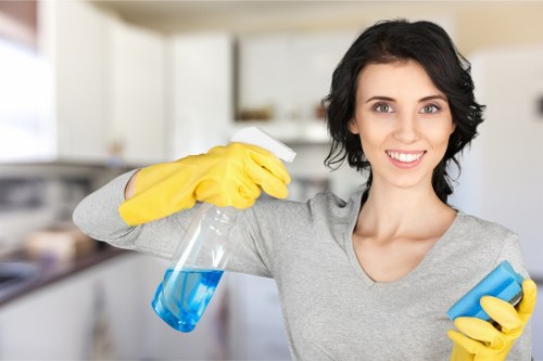 Professional cleaner working in a Tooting residential property