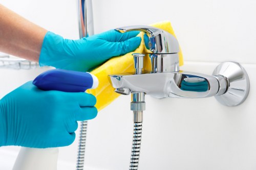 Local oven cleaner working in a compact Tooting flat kitchen