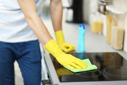 Cleaner Tooting cleaner organizing tools and following safe work practices