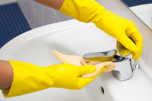 Local team cleaning a kitchen or hallway hard floor in Tooting